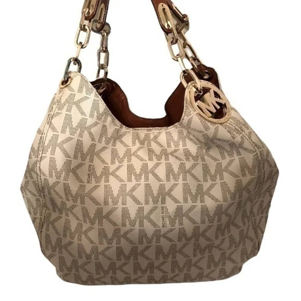 Michael kors white monogram triple compartment bag